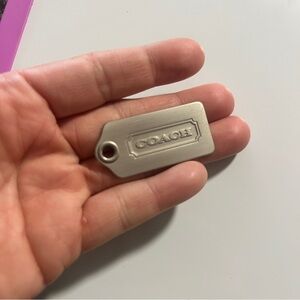 Coach Metallic Silver Bag Tag